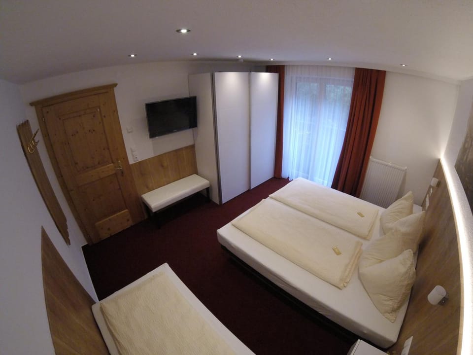 Bed, People, Balcony/Terrace, Seating area, Bedroom, Guests, Garden view, Mountain view, children, young children, older children, group of guests, cot, Family