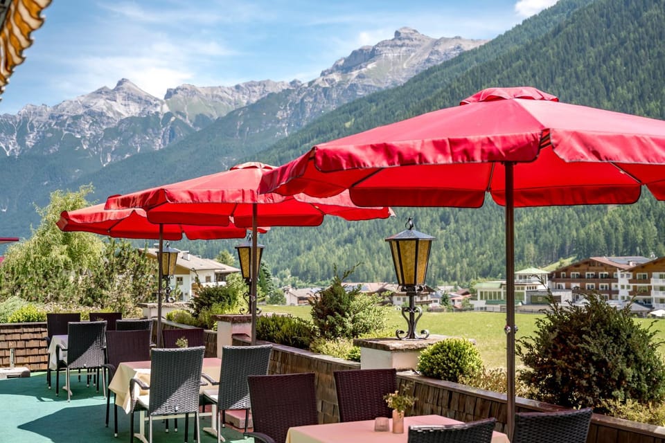 Property building, Restaurant/places to eat, Natural landscape, Garden, Mountain view