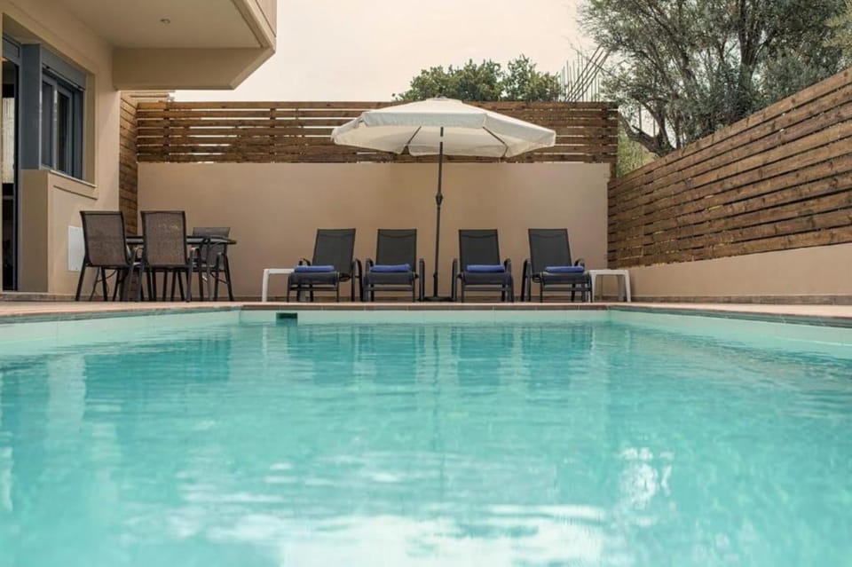 Patio, Day, Pool view, Swimming pool, sunbed