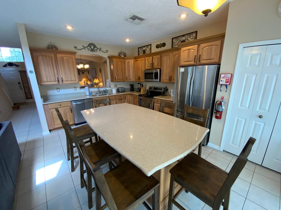 Kitchen or kitchenette, dishwasher, oven, stove, toaster