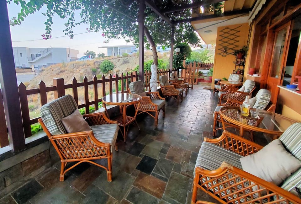 Property building, Patio, Living room, Seating area, Dining area