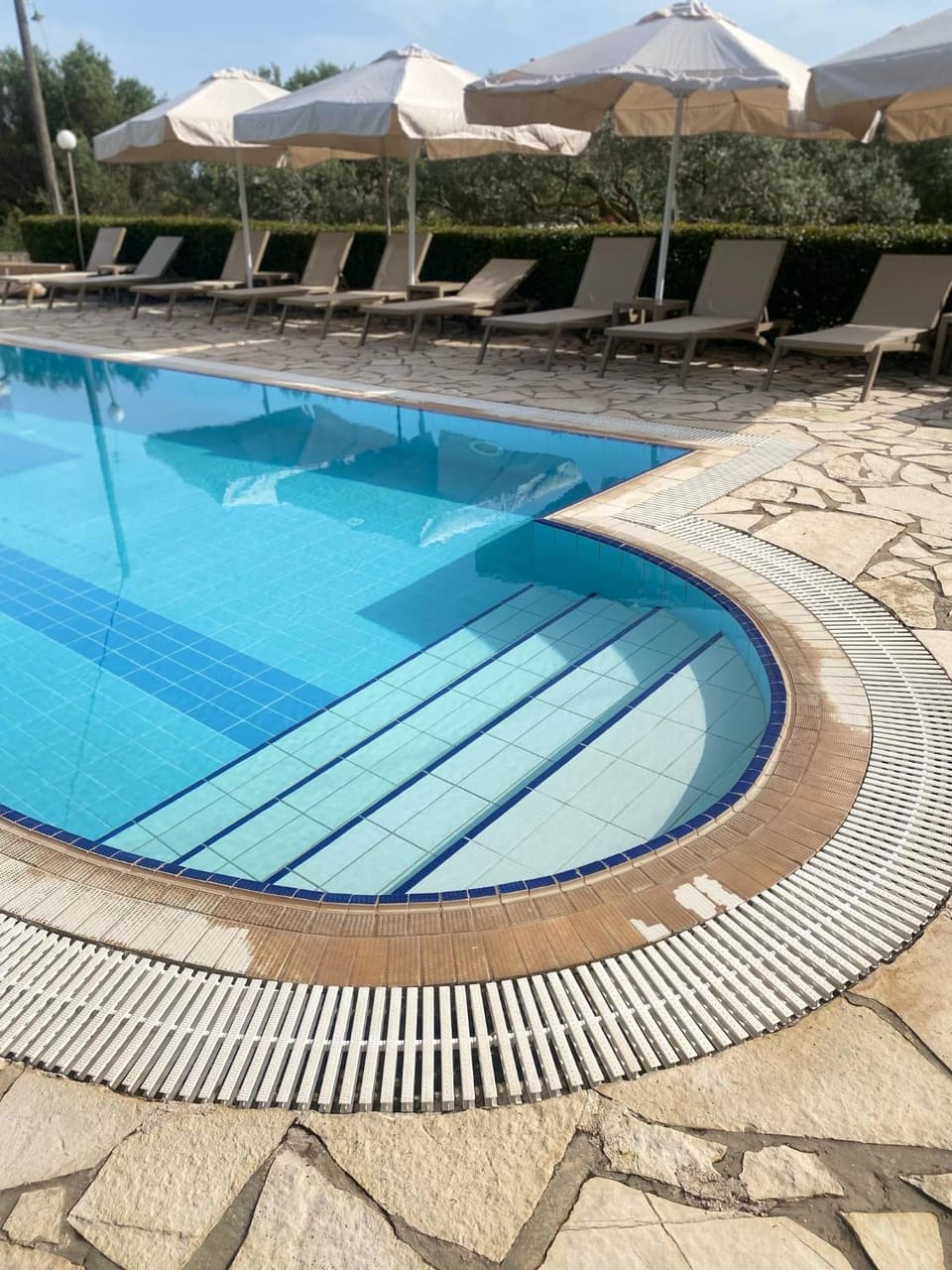 Swimming pool, sunbed