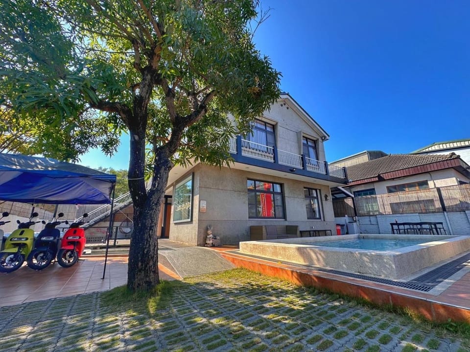 Property building, Patio, Day, Pool view, Swimming pool