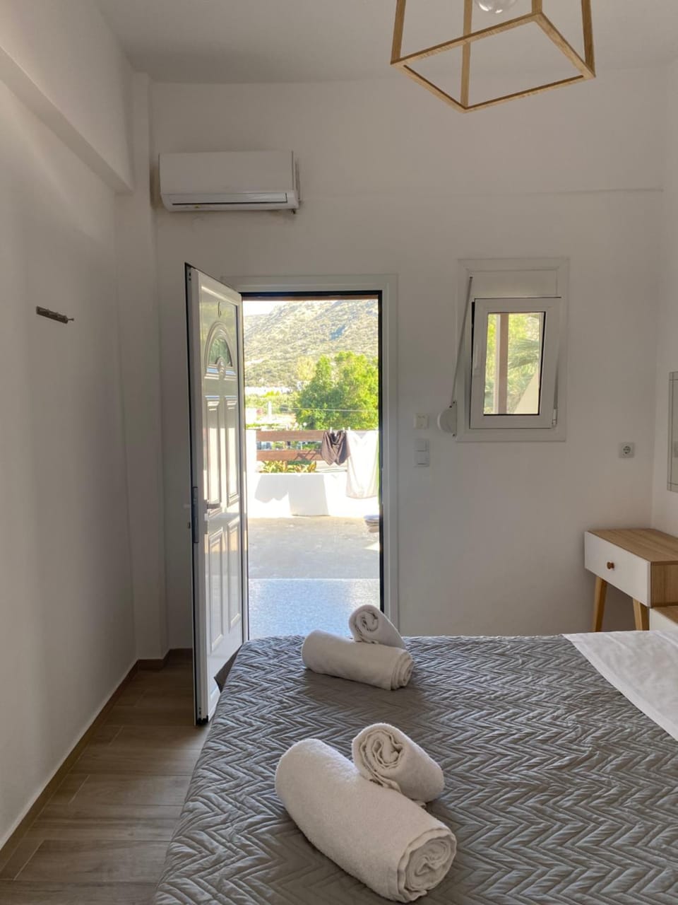 Bed, Photo of the whole room, Bedroom, towels, air conditioner