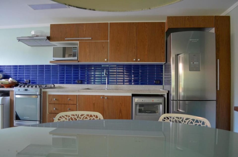 Casa em Condomínio 4 dorm Praia da Enseada em Ubatuba Apartment in State of São Paulo