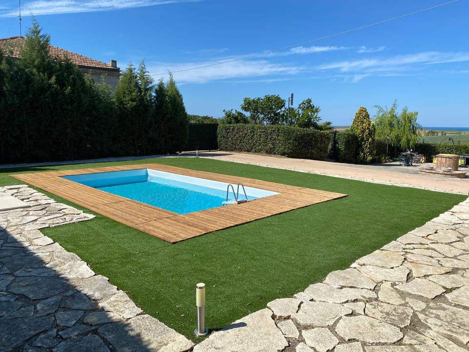 Property building, Living room, Swimming pool