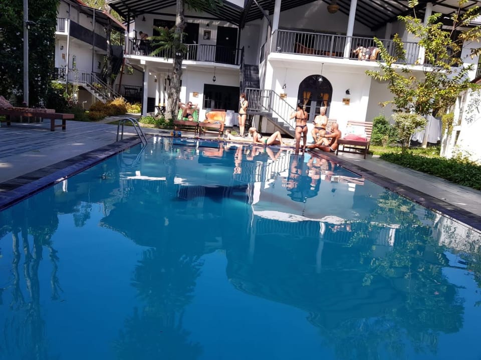 People, Pool view, Swimming pool, sunbed
