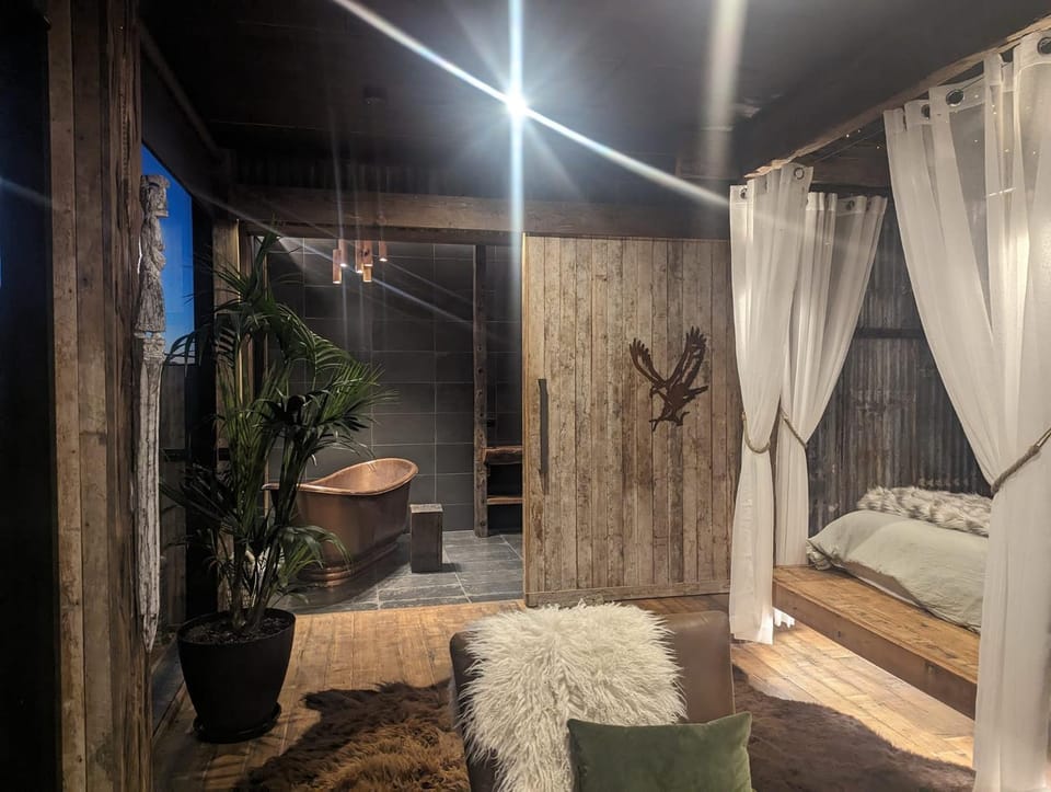 Bed, Living room, Seating area, Bedroom