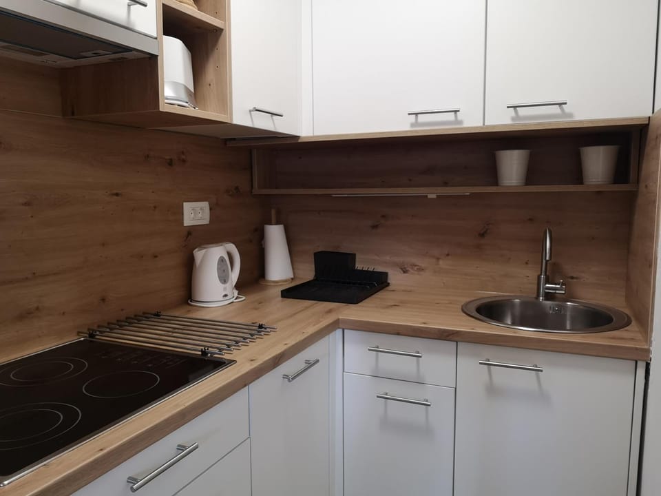 Kitchen or kitchenette, stove