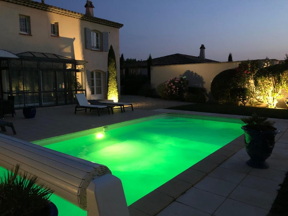 Property building, Patio, Night, Pool view, Swimming pool, Sunset, sunbed