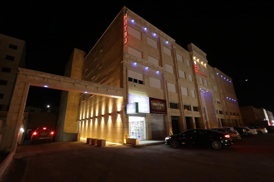 Property building, Facade/entrance, Night, Parking