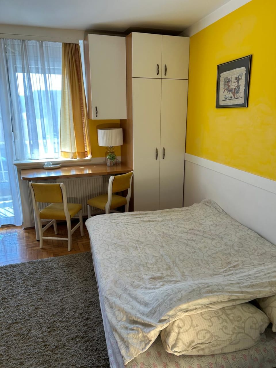 Bed, Dining area, wardrobe