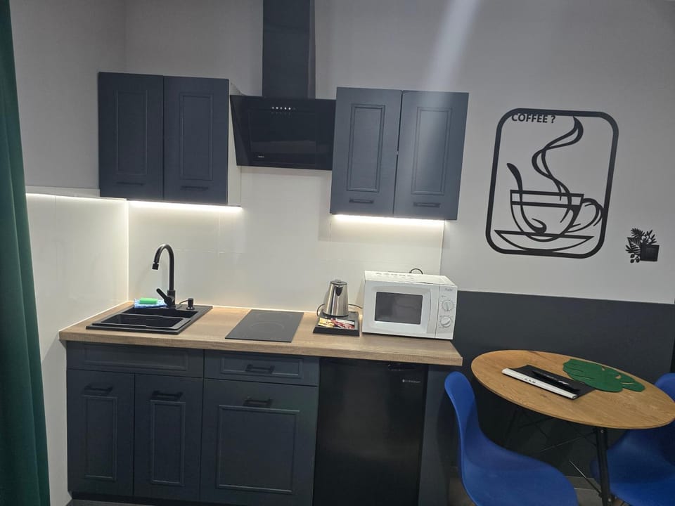 Kitchen or kitchenette, stove
