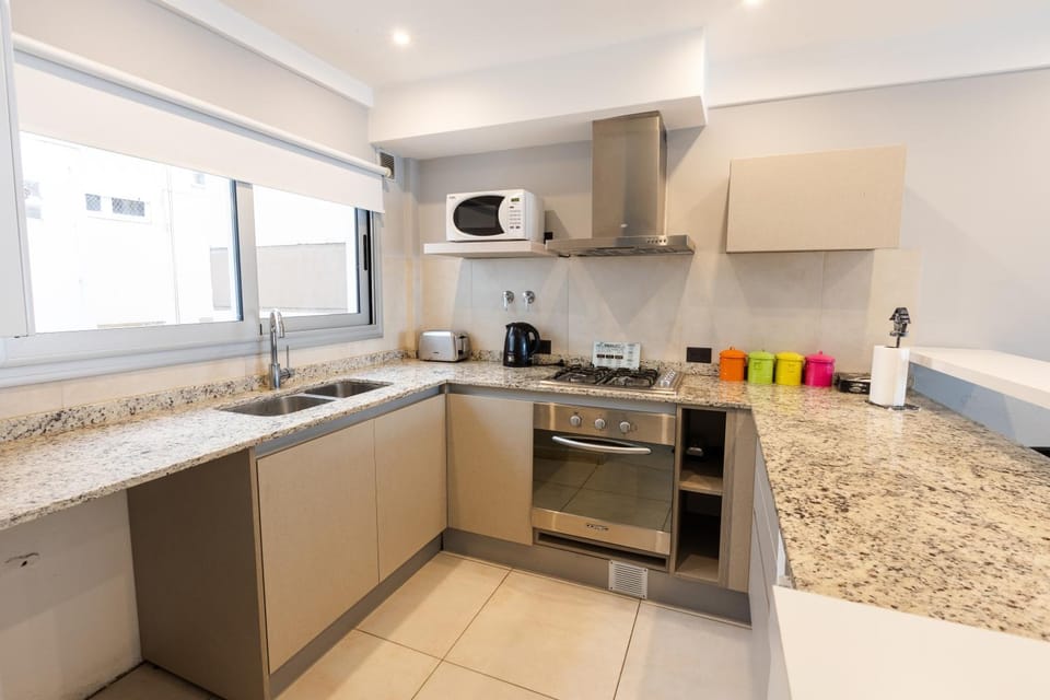 Kitchen or kitchenette, oven, toaster