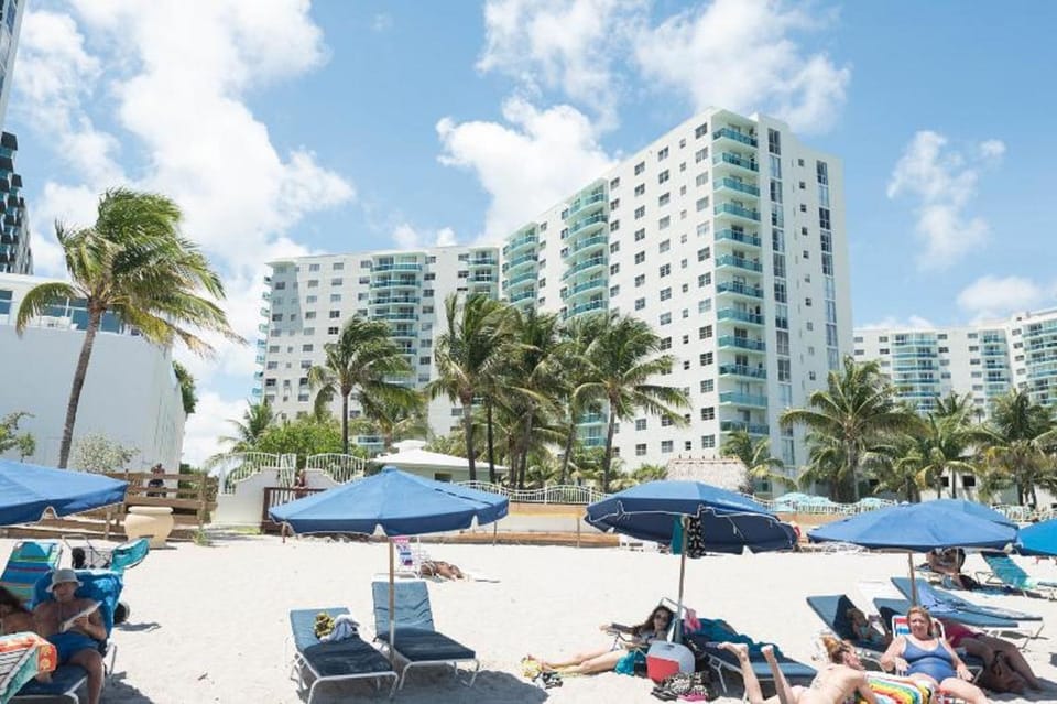 Property building, People, Beach, Location, sunbed