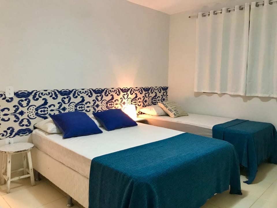 3 QUARTOS,10 min a pé Praia Grande, GARAGEM 3 carros, Churrasqueira, Wi-Fi e Cozinha Completa House in State of Rio de Janeiro