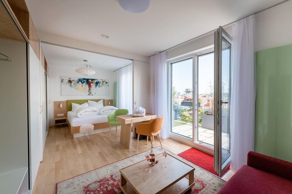 Bed, Living room, Seating area, Bedroom