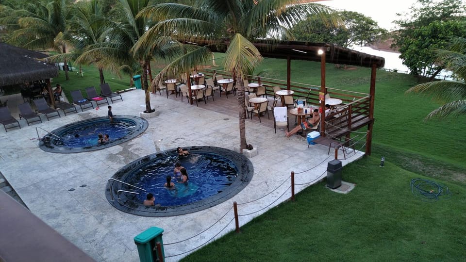 Aldeia do Lago C104- Churrasqueira, COOLER liberado no parque aquático, internet no ap, rampa no lago, pesqueiro, carregador carro elétrico Apartment in State of Goiás