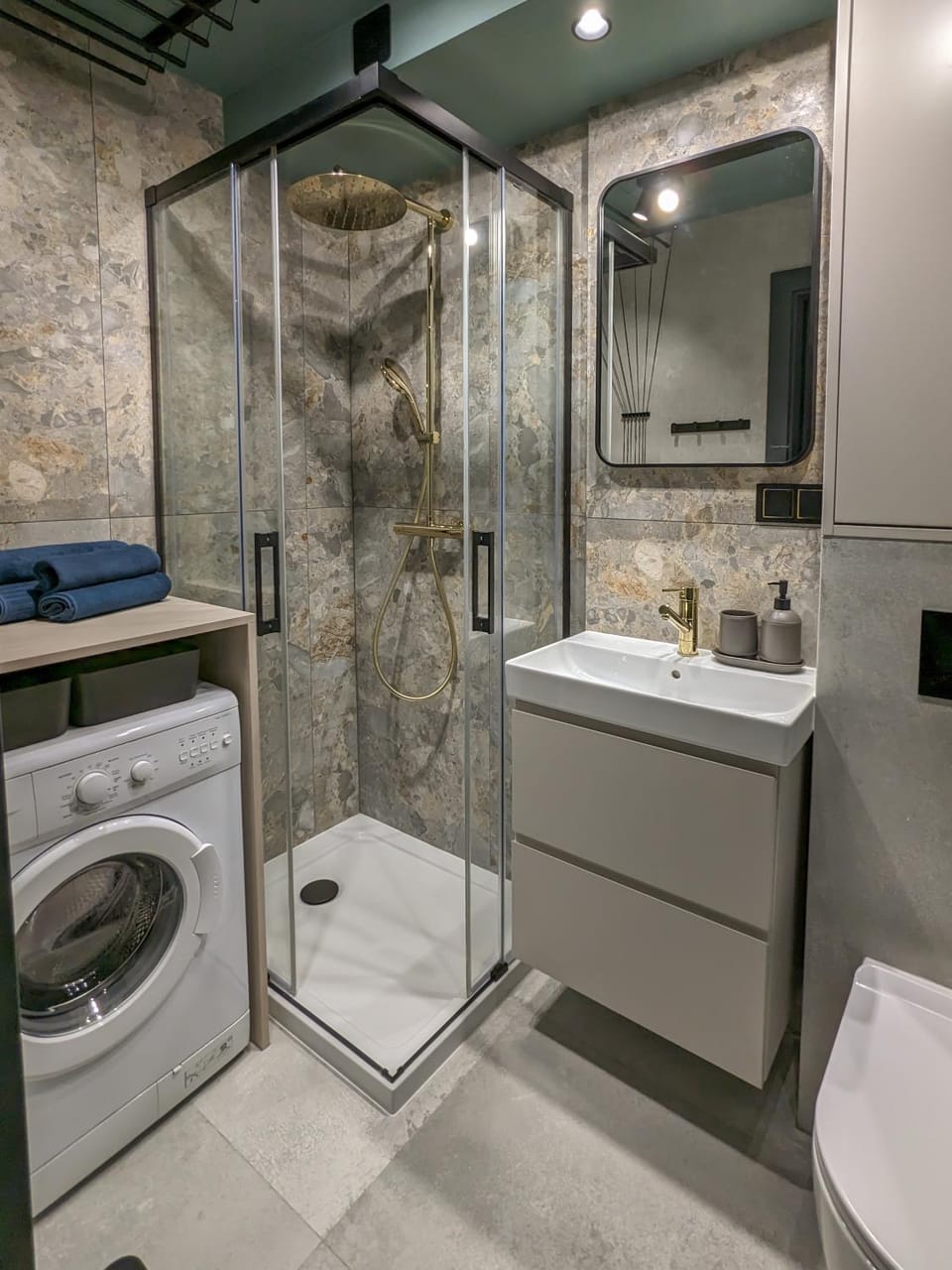 Shower, Toilet, Bathroom, towels, washing machine, dryer