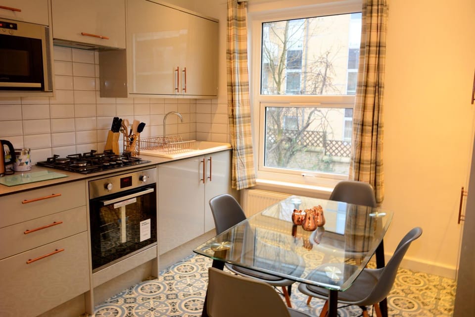 Kitchen or kitchenette, Dining area, oven, stove, toaster