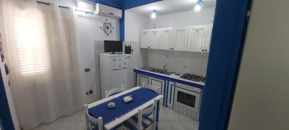 Kitchen or kitchenette, oven