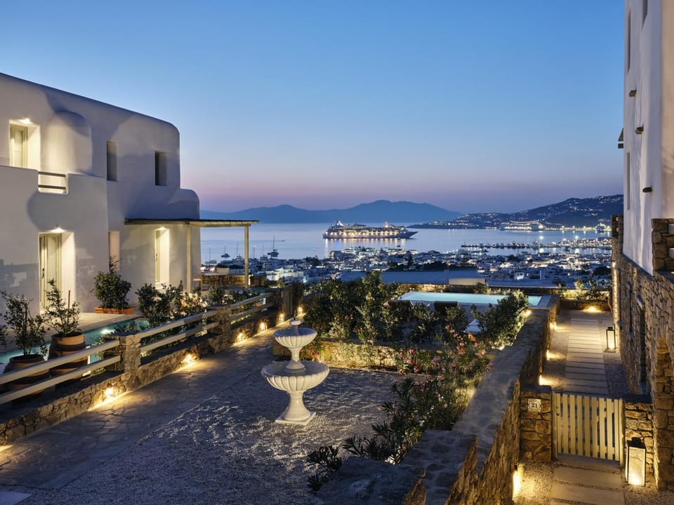 Property building, Night, Natural landscape, Pool view, Sea view