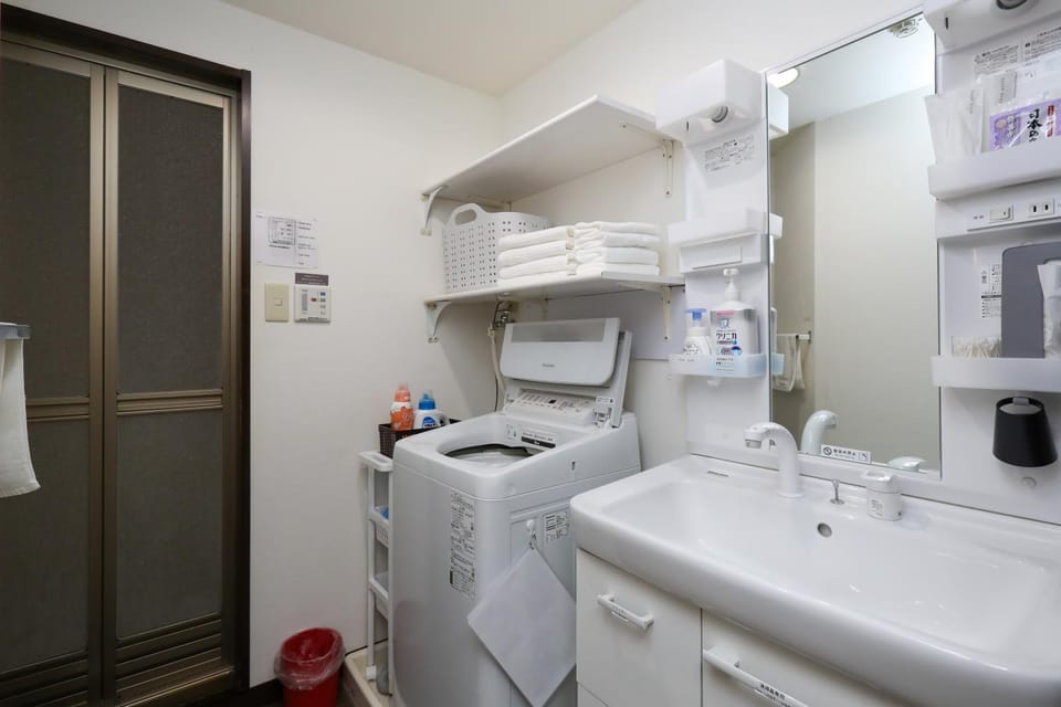 Bathroom, towels, washing machine