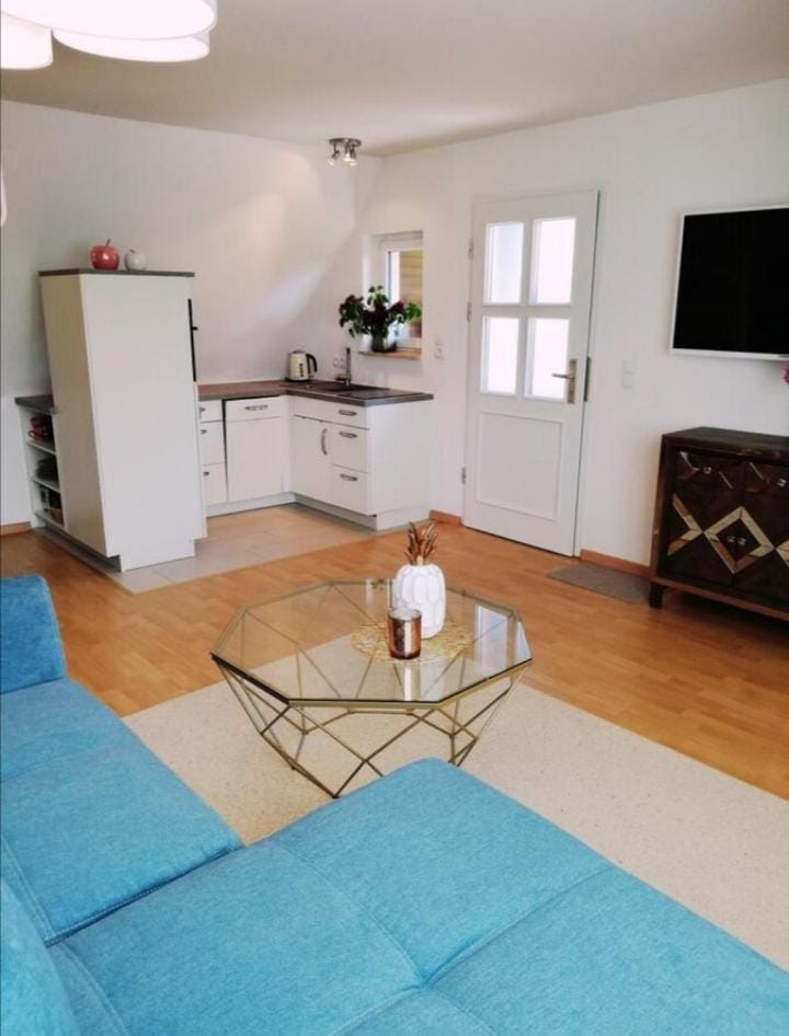 Kitchen or kitchenette, Living room, Seating area, Dining area