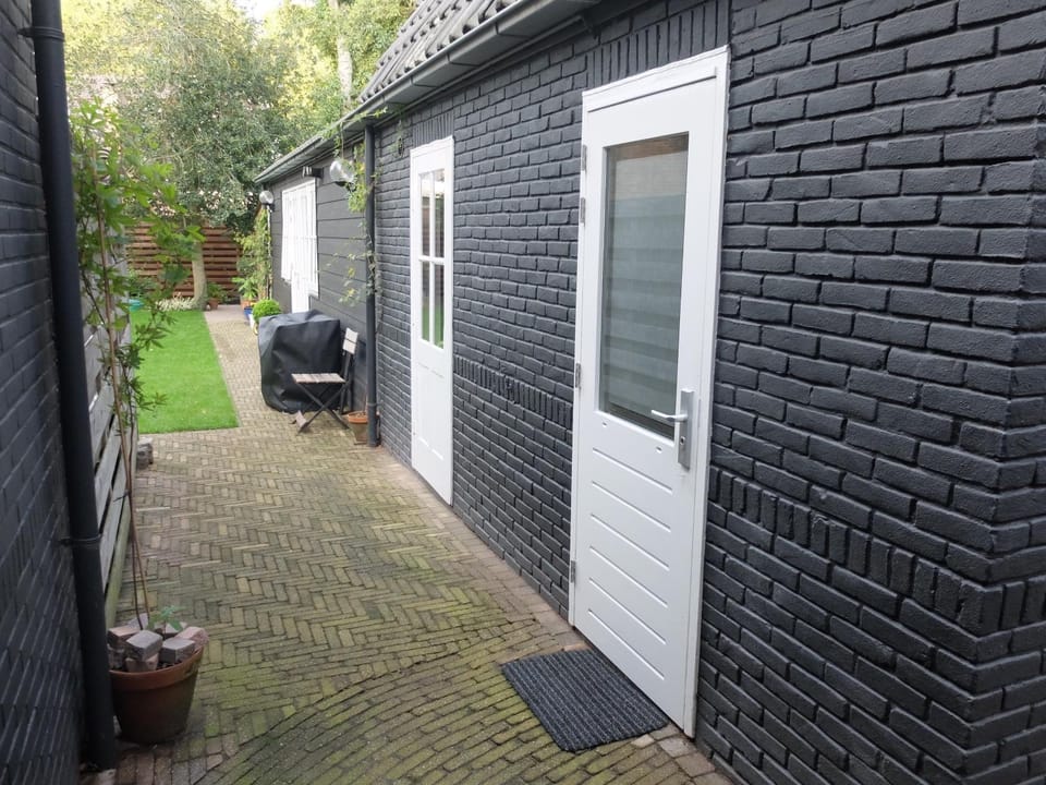 Facade/entrance, Day, On site, Garden view