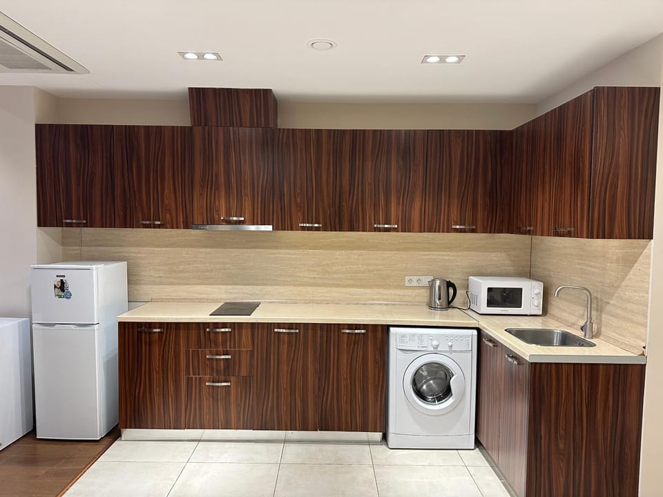 Coffee/tea facilities, Kitchen or kitchenette, oven, toaster, washing machine