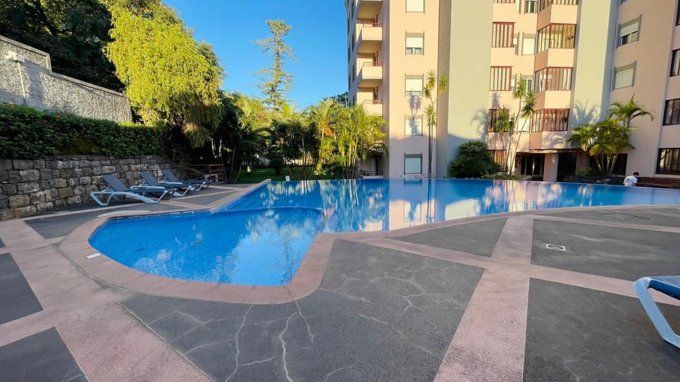 Property building, Pool view, Swimming pool, sunbed