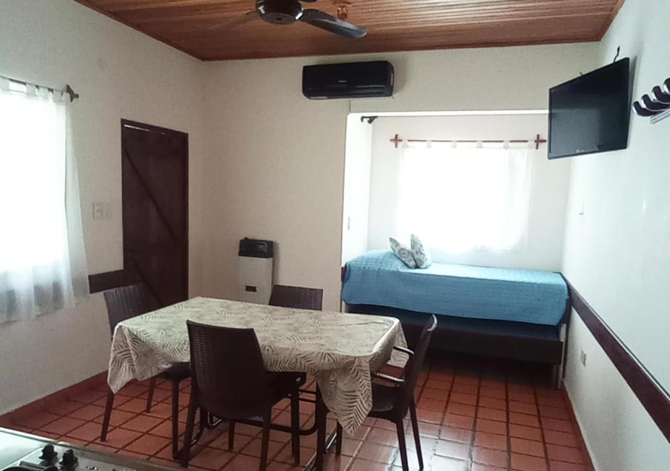 Bed, Photo of the whole room, Dining area, heating, stove, kitchen, air conditioner