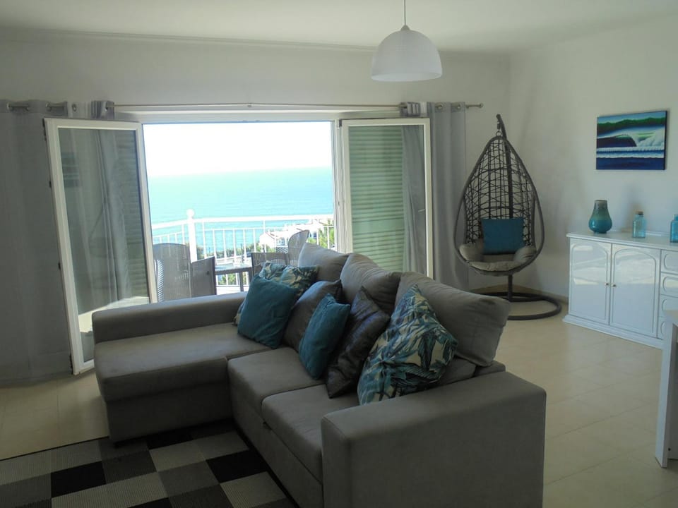 View (from property/room), Living room, Seating area, Sea view