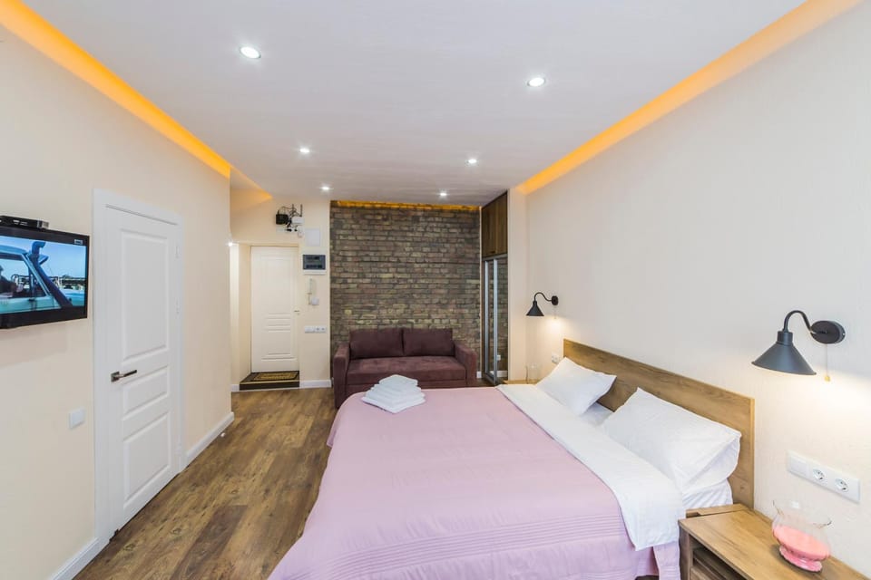Bed, Living room, Seating area, Bedroom