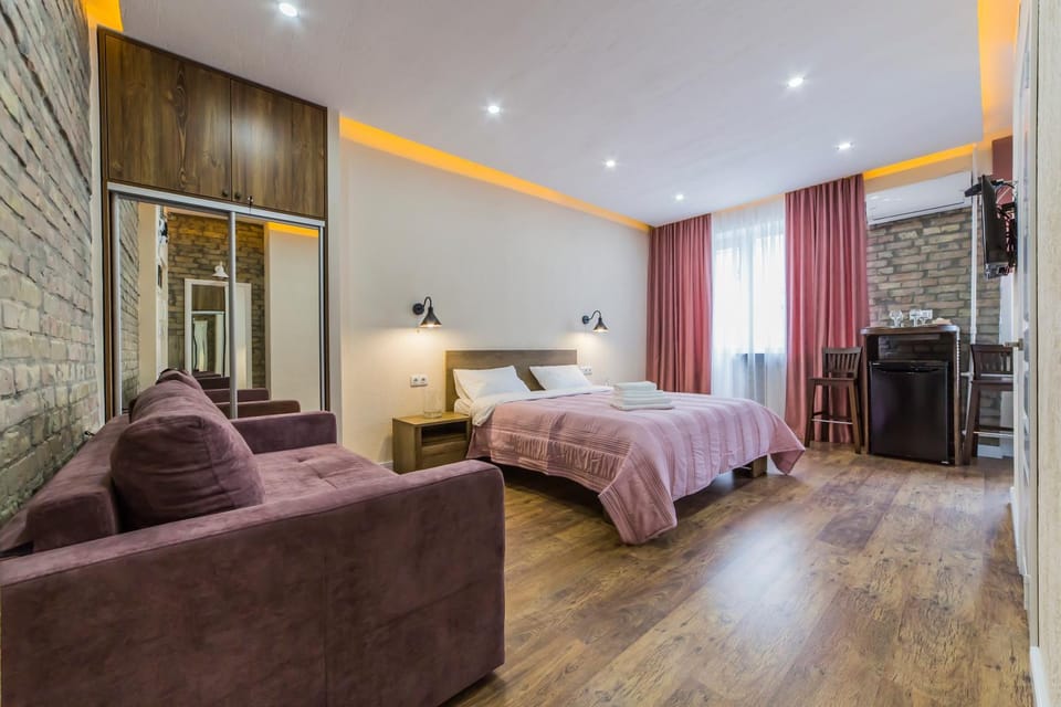 Bed, Living room, Seating area, Bedroom