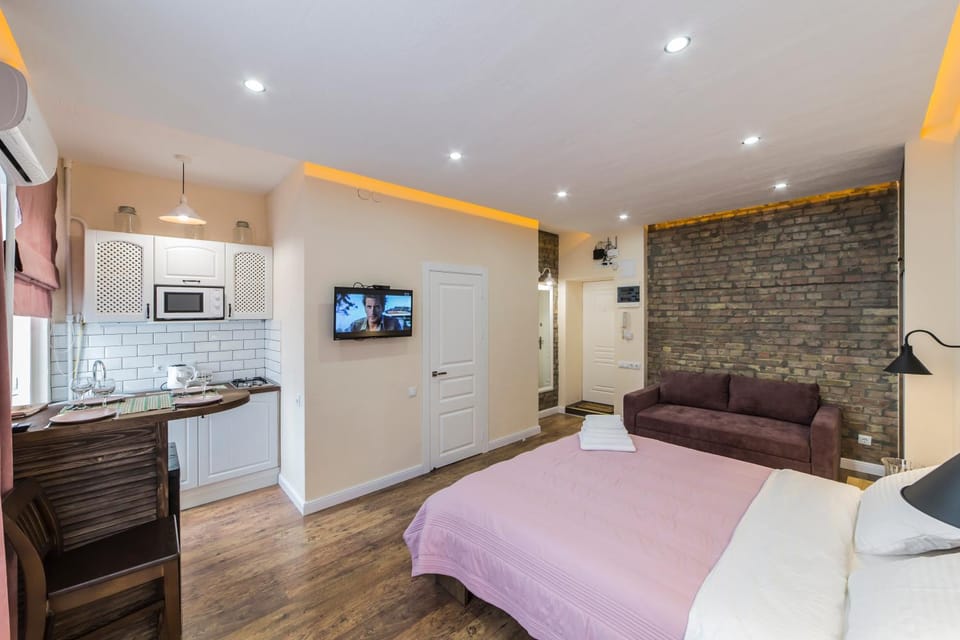 Bed, Living room, Seating area, Bedroom