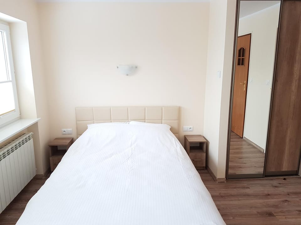 Bed, Living room, Seating area, Bedroom