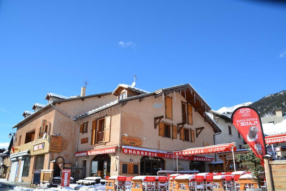 Restaurant/places to eat, Facade/entrance, Property logo or sign, Mountain view, Street view