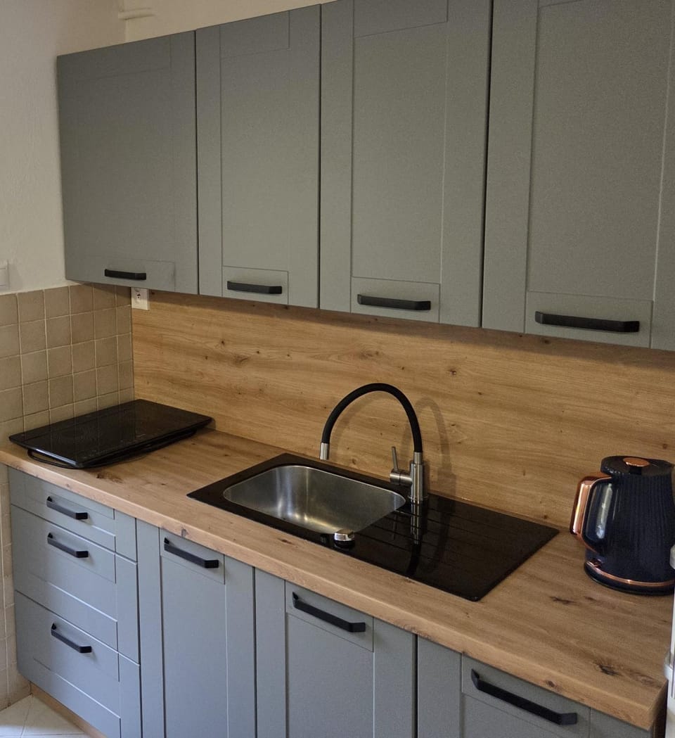 Kitchen or kitchenette, stove