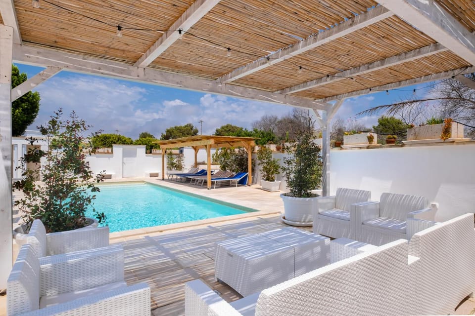 Patio, Day, Natural landscape, Pool view, Swimming pool, sunbed