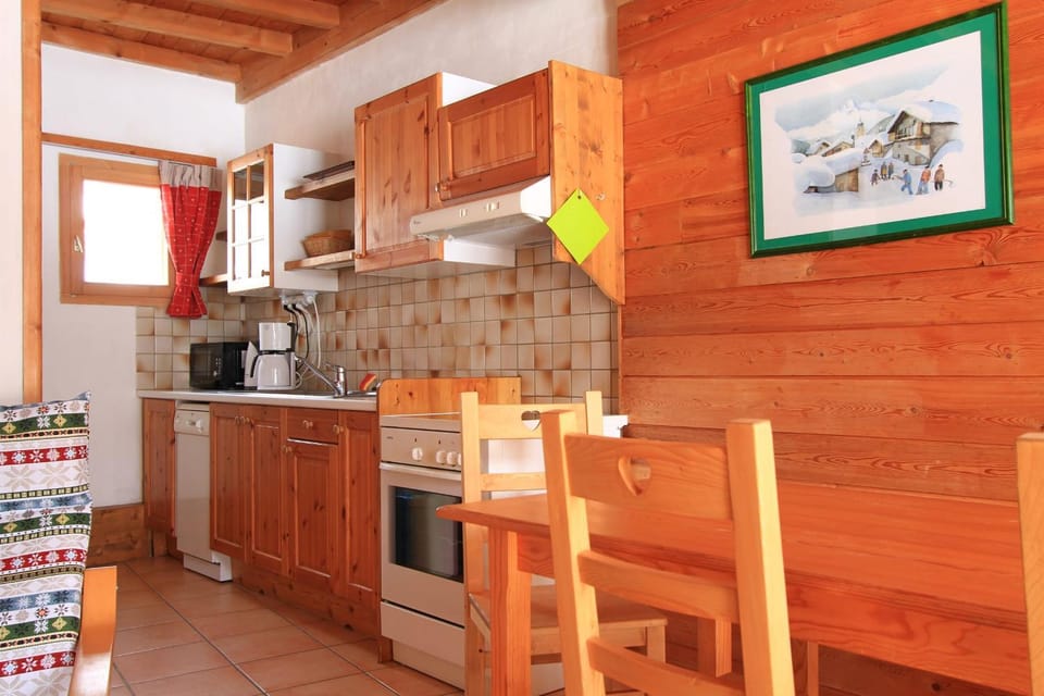 Kitchen or kitchenette, dishwasher, oven, stove, toaster