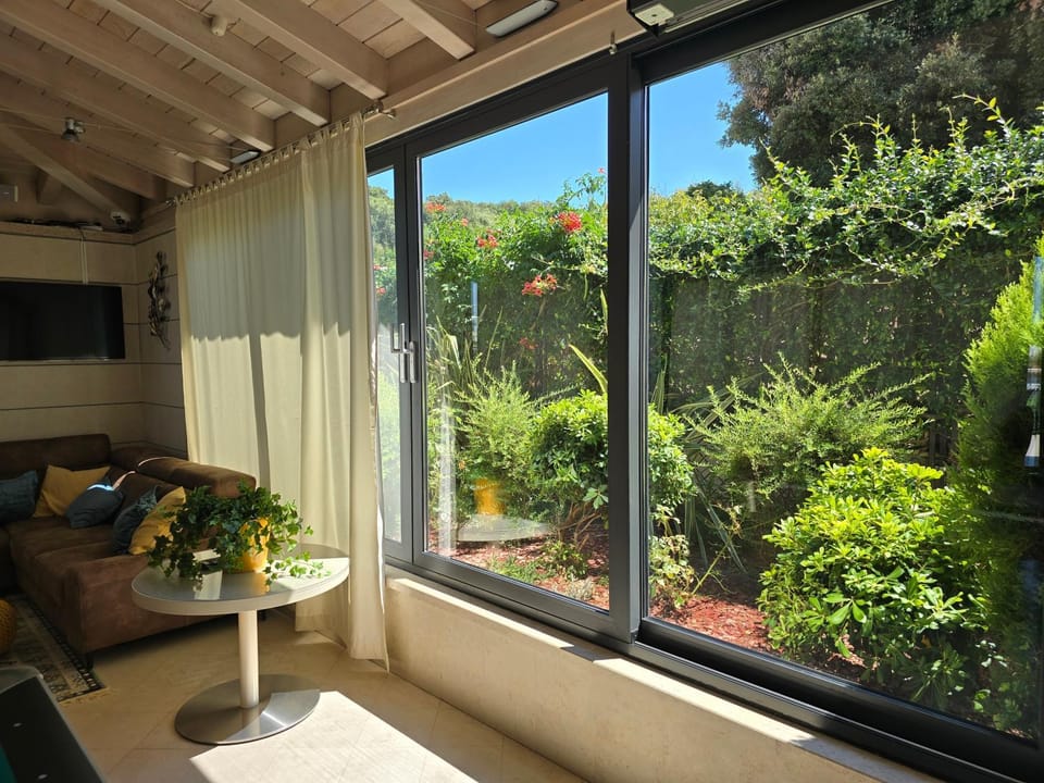 Living room, Seating area, Garden view