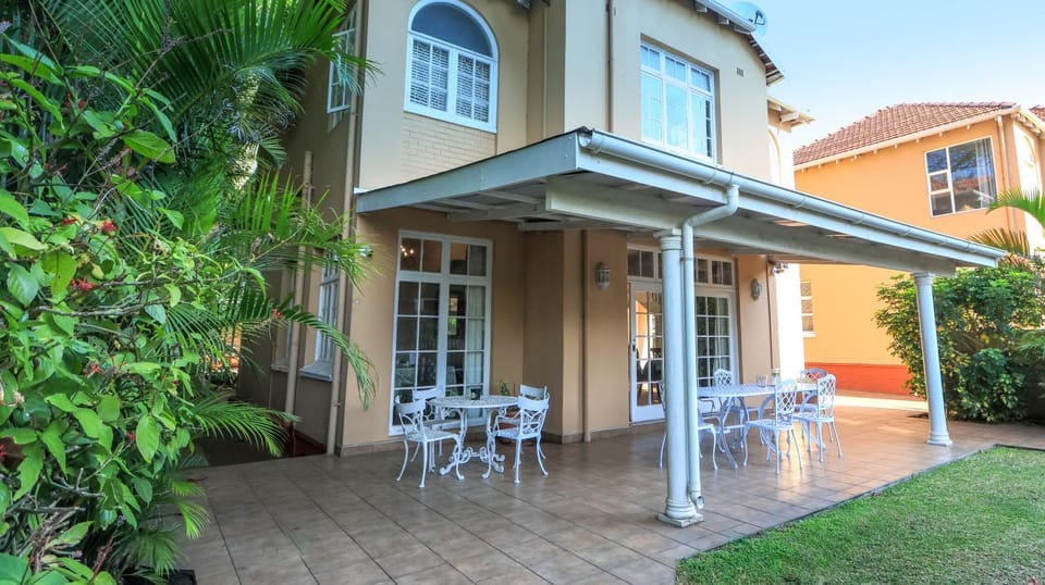 Property building, Patio, Day, Seating area
