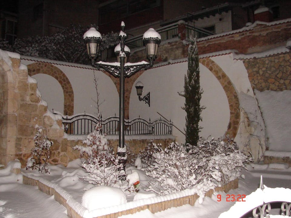 Property building, Patio, Night, Winter, Place of worship, Garden, Decorative detail, On site, Garden view