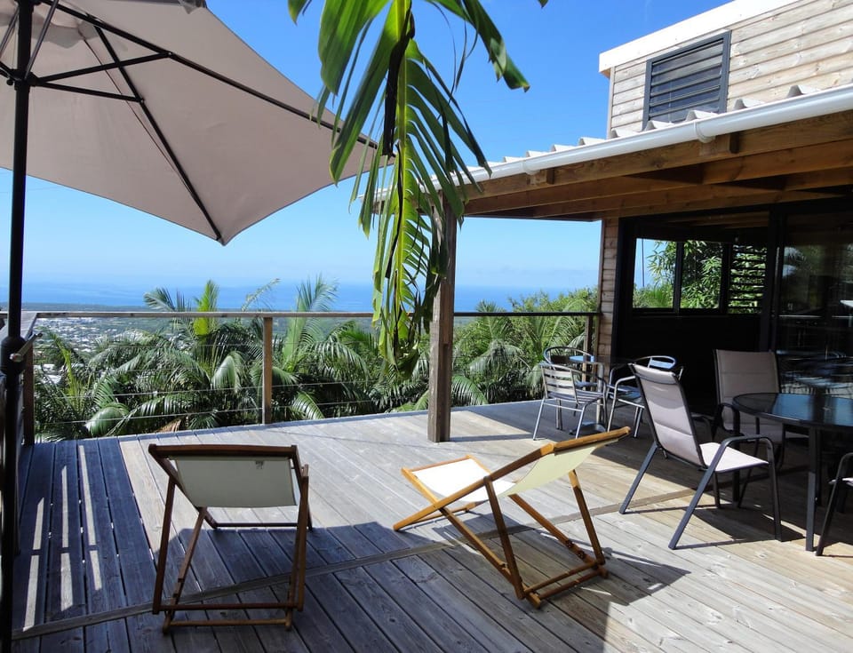 Lounge des hauts, 3 maisons à L'étang-Salé avec vue sur l'Océan indien et la forêt Nature lodge in Saint-Leu