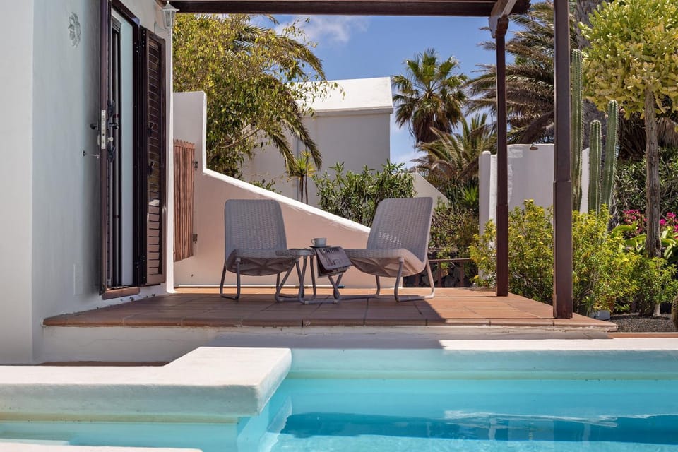 Property building, Living room, Swimming pool