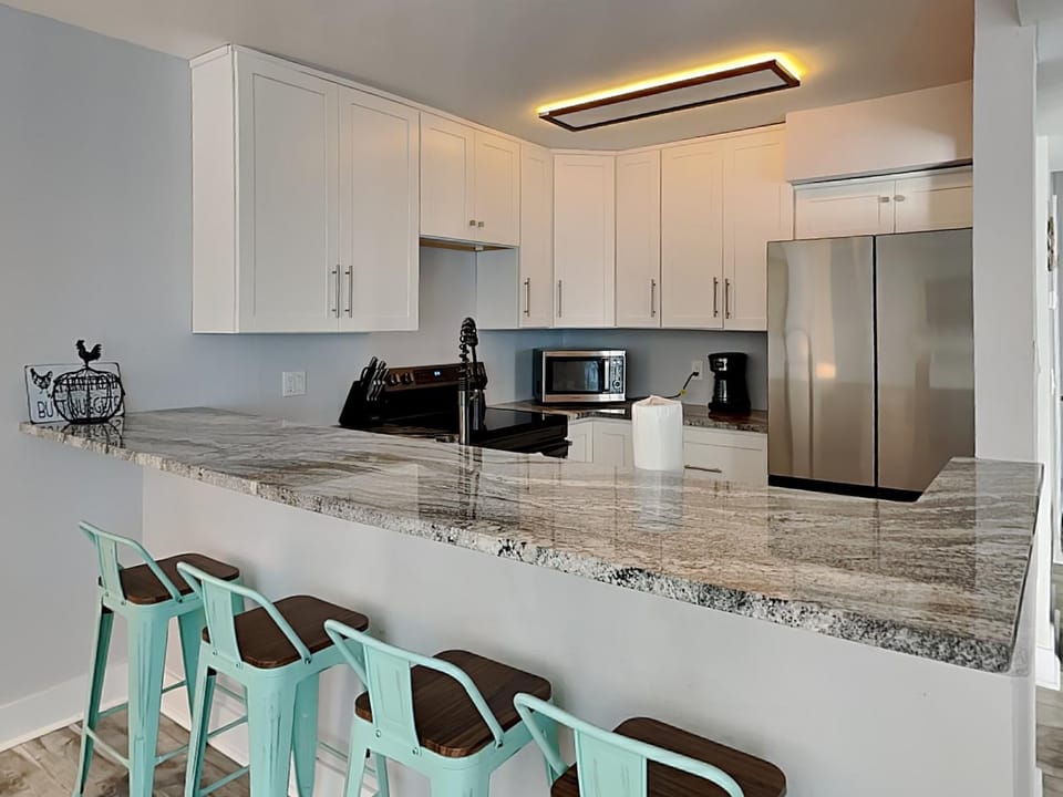 Kitchen or kitchenette, Seating area, furniture, microwave