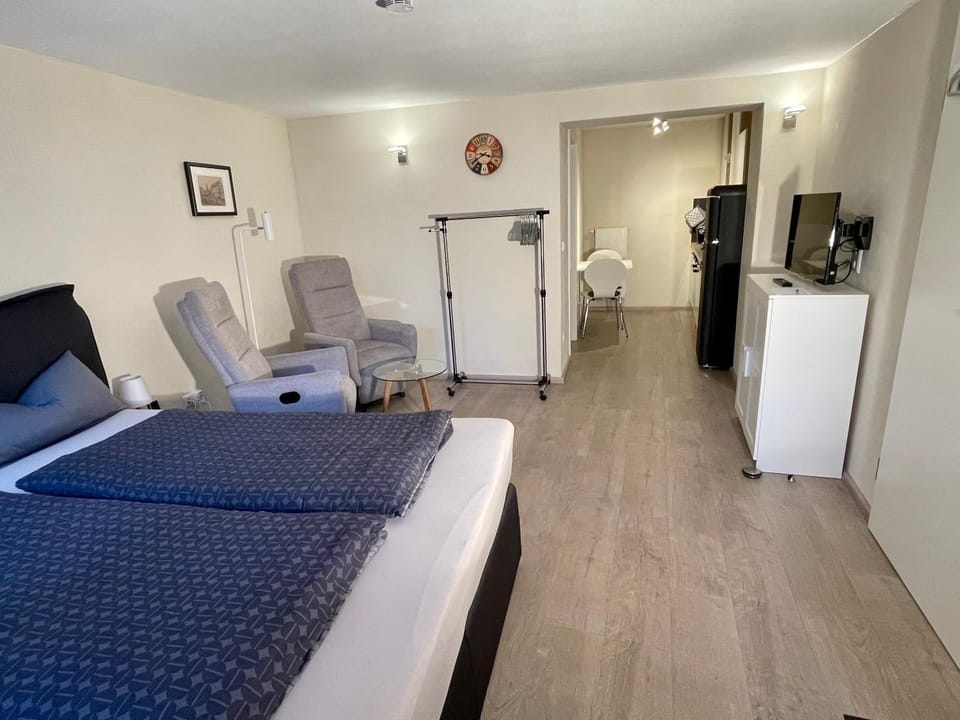 Bed, Living room, Seating area