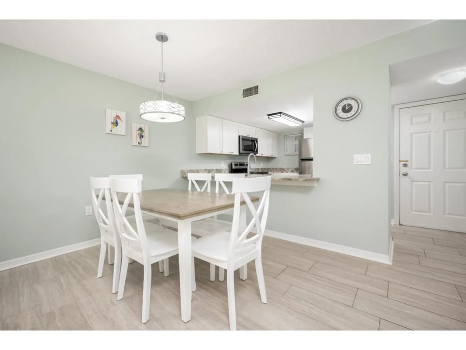 Kitchen or kitchenette, Dining area, furniture, microwave, air conditioner