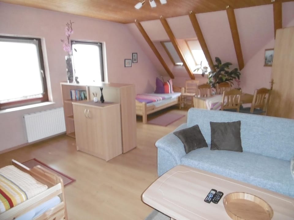 Bed, Living room, Seating area, Bedroom